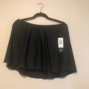 Solid black torrid skater swim skirt